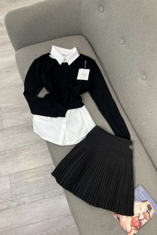 Bluza e thurur është ngjyrë e zezë.